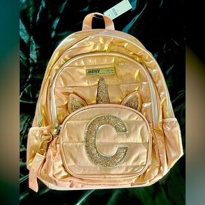 Justice Rose Unicorn Monogramed C backpack, lunch bag, keychain and pencil case.